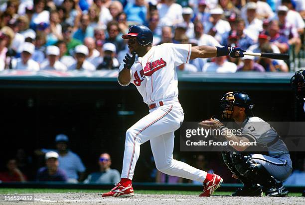 Albert Belle of the Cleveland Indians bats against the Chicago White Sox during an Major League Baseball game circa 1994 at Cleveland Stadium in...