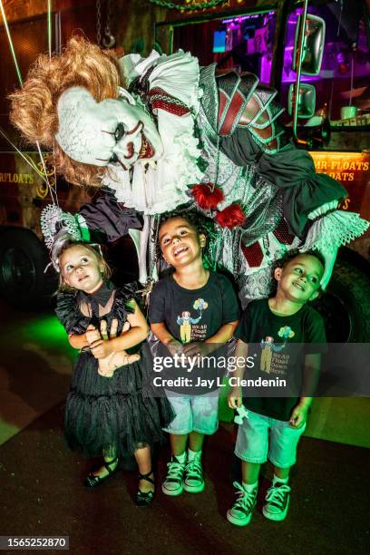 Long Beach, CA Professional cosplayer Mr. Floats, as Pennywise, from the film, "IT," poses for photos inside his "Mr Floats: Carnevil Games," in the...