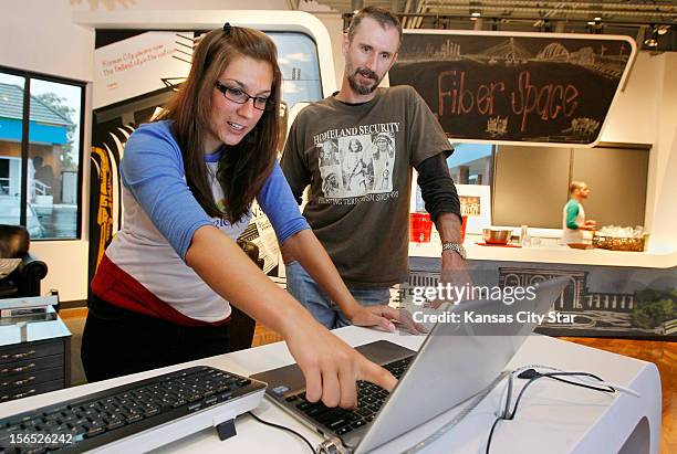 Google announces the build-out schedule for qualifying fiberhoods, September 13, 2012. In the Google Fiber office, Christina Komonce, left, a team...