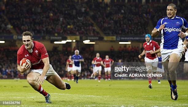 Wales' centre Ashley Beck scores a try against Samoa during their International Rugby Union match at The Millennium Stadium in Cardiff, Wales, on...