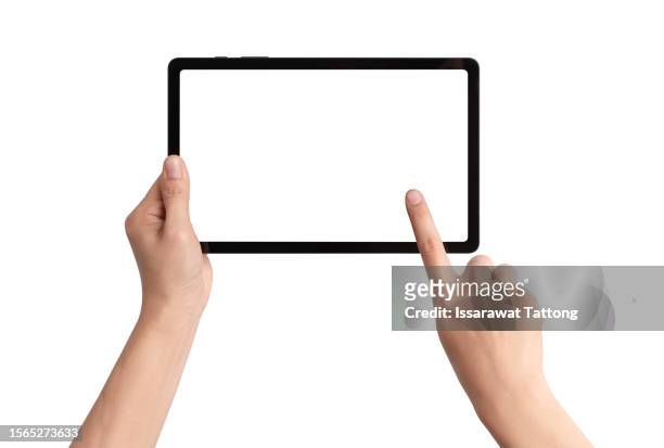 female teen hands using tablet pc with white screen, isolated - tablet hand stock-fotos und bilder
