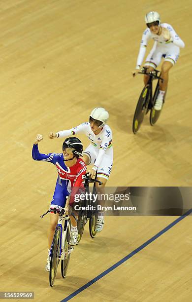 Elinor Barker of Great Britain celebrates with team mates Laura Trott and Dani King after winning the Women's Team Pursuit final during day one of...
