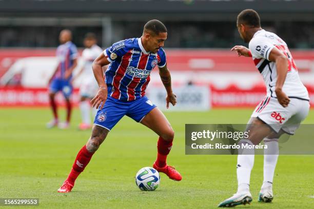 Gilberto of Bahia competes for the ball with Caio of Sao Paulo during the match between Sao Paulo and Bahia as part of Brasileirao Series A 2023 at...