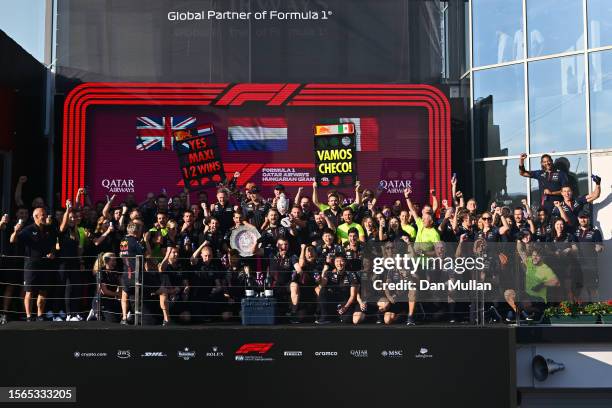 Race winner Max Verstappen of the Netherlands and Oracle Red Bull Racing and Third placed Sergio Perez of Mexico and Oracle Red Bull Racing celebrate...