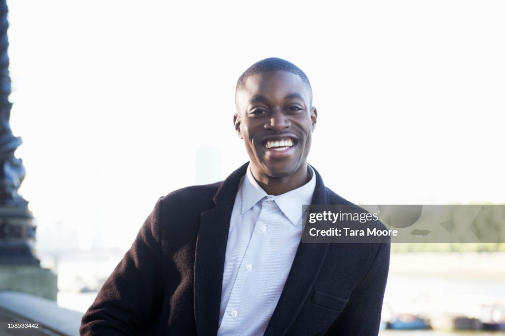 Young man smiling to camera