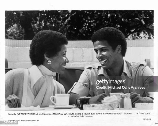 Vernee Watson-Johnson and Michael Warren laugh over coffee in a scene from the film 'Norman... Is That You?', 1976.