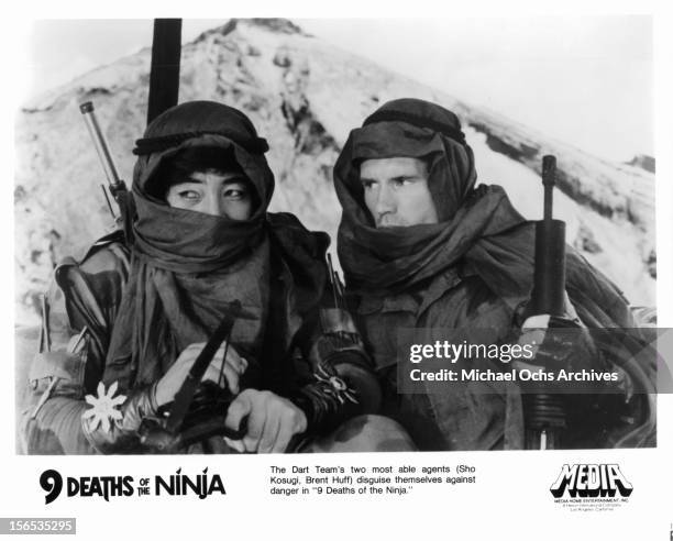 Sho Kosugi and Brent Huff go undercover in a scene from the film 'Nine Deaths Of The Ninja', 1985.