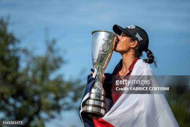 France's Celine Boutier kisses her trophy after winning the Evian Championship, a women's LPGA major golf tournament in Evian-les-Bains, French Alps,...