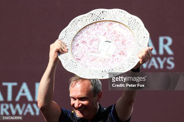 Red Bull Racing Head of Car Engineering Paul Monaghan celebrates on the podium during the F1 Grand Prix of Hungary at Hungaroring on July 23, 2023 in...