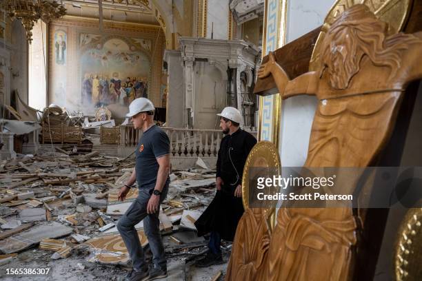The Mayor of Odesa Hennadii Trukhanov surveys the damage after a Russian missile struck the historic Holy Transfiguration Cathedral in central Odesa,...