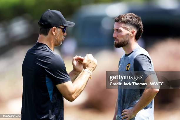 Matt Doherty of Wolverhampton Wanderers speaks with Julen Lopetegui, Manager of Wolverhampton Wanderers during a pre-season training camp on July 22,...