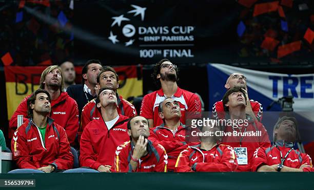 The Spanish team look to the big screen as a line call challenge is made during Nicolas Almagro of Spains match against Tomas Berdych of Czech...