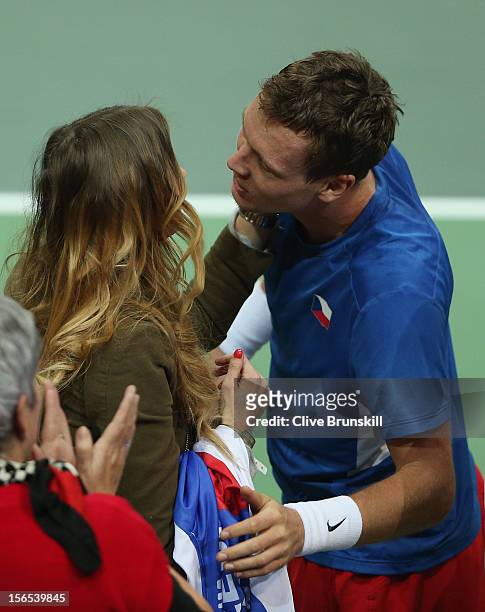 Tomas Berdych of Czech Republic about to kiss his girlfriend Ester Satorova after his five set win against Nicolas Almagro of Spain during day one of...