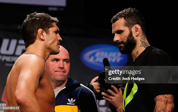 Opponents Patrick Cote and Alessio Sakara face off during the official UFC 154 weigh in at New City Gas on November 16, 2012 in Montreal, Quebec,...