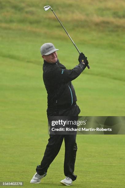 Greig Hutcheon of Scotland hits an approach shot on the 2nd hole during Day Four of The Senior Open Presented by Rolex at Royal Porthcawl Golf Club...