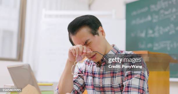 male professor has eyes pain - itchy eyes stock pictures, royalty-free photos & images