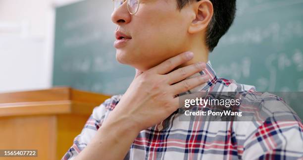 male professor has sore throat - the vocal cords stock pictures, royalty-free photos & images