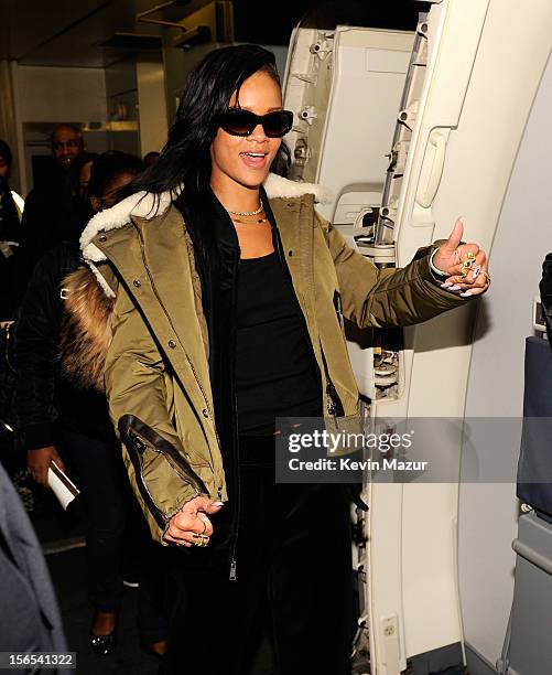 Rihanna boards her plane following her show at The Danforth on November 15, 2012 in Toronto, Ontario. Rihanna's 777 Tour - 7 countries, 7 days, 7...