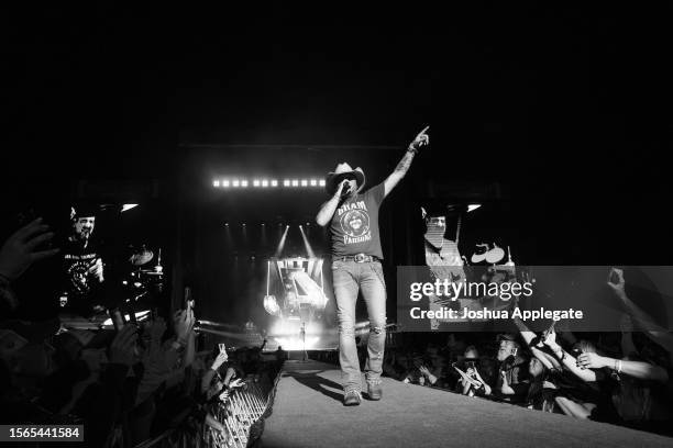 Jason Aldean performs onstage at Country Thunder Wisconsin - Day 3 on July 22, 2023 in Twin Lakes, Wisconsin.