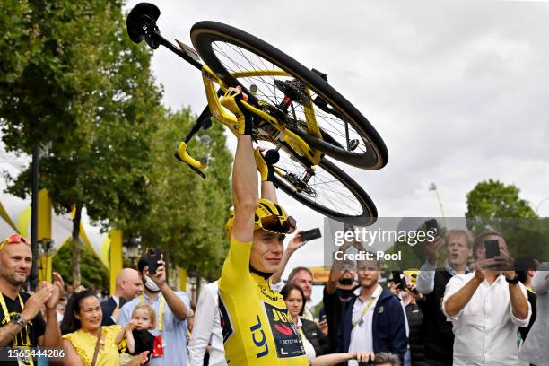 Jonas Vingegaard of Denmark and Team Jumbo-Visma - Yellow Leader Jersey celebrates as final overall winner after the stage twenty-one of the 110th...