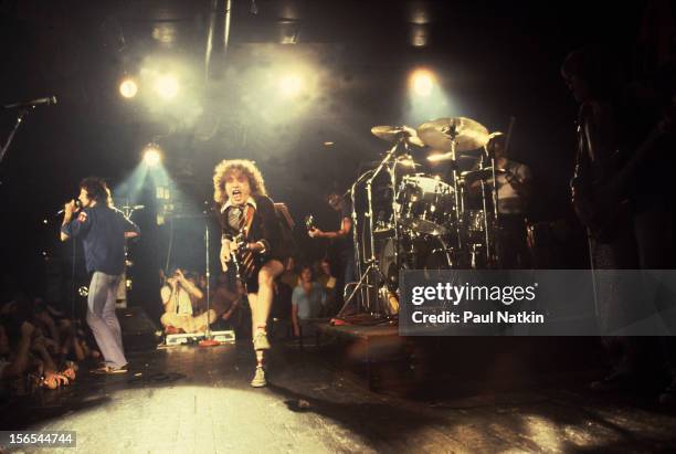 Australian rock group AC/DC performs at the Aragon Ballroom, Chicago, Illinois, September 22, 1978. Pictured are Bon Scott , Angus Young, Phil Rudd,...