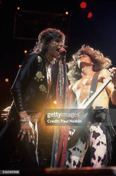American rock group Aerosmith performs onstage, Chicago, Illinois, July 1, 1993. Pictured are Steven Tyler and Joe Perry.