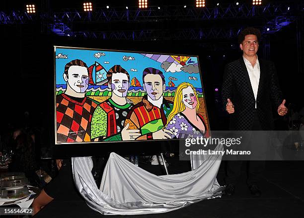 Artist Romero Britto poses onstage at the Zenith Watches Best Buddies Miami Gala at Marlins Park on November 16, 2012 in Miami, Florida.