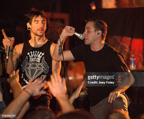 Vocalists Tyler Carter and Michael Bohn of the rock band Issues performs at The Emerson Theater on November 6, 2012 in Indianapolis, Indiana.