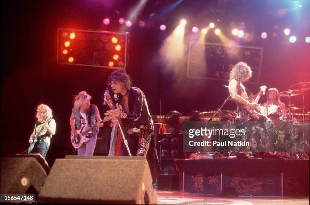 American rock group Aerosmith performs onstage, Chicago, Illinois, July 1, 1994. Pictured are, from left, Brad Whitford, Tom Hamilton, Steven Tyler,...