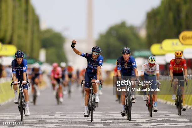Thibaut Pinot of France and Lars Van Den Berg of The Netherlands and Team Groupama-FDJ cross the finish line during the stage twenty-one of the 110th...