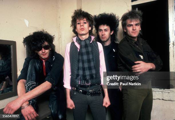 Portrait of Welsh rock group The Alarm backstage at the Aragon Ballroom, Chicago, Illinois, April 13, 1984. Pictured are, from left, Nigel Twist,...