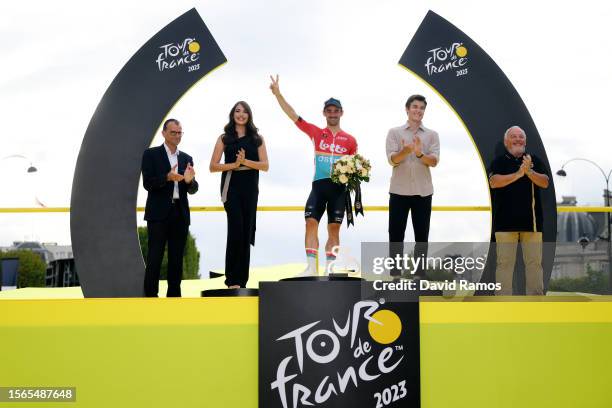 Victor Campenaerts of Belgium and Team Lotto Dstny celebrates at podium most combative prize winner during the stage twenty-one of the 110th Tour de...