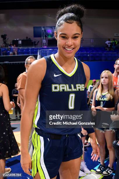 Satou Sabally of the Dallas Wings smiles after the game against the Washington Mystics on July 28, 2023 at the College Park Center in Arlington, TX....