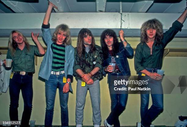 Portrait of British heavy metal band Iron Maiden backstage at the Rosemont Horizon during their Beast on the Road Tour, Chicago, Illinois, September...