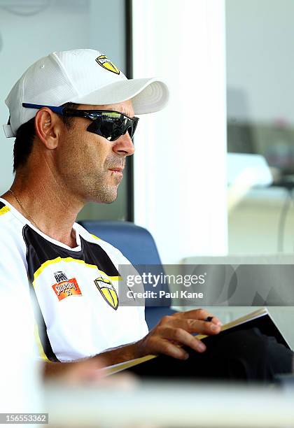 Warriors coach Justin Langer looks on during the Ryobi Cup One Day match between the Western Australia Warriors and the South Australian Redbacks at...