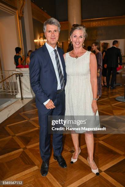 Harald Krüger and Bettina Krüger attend "Oper Fuer Alle" as part of the Munich Opera Festival 2023 at Bayerische Staatsoper on July 23, 2023 in...