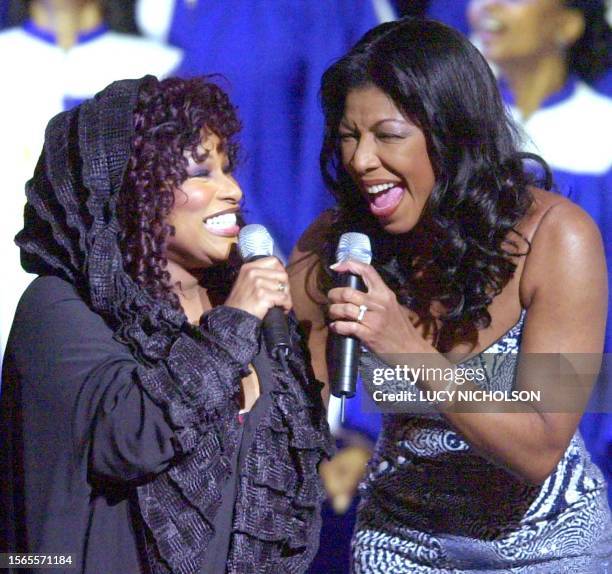 Singers Chaka Khan and Natalie Cole perform a tribute to actor Sidney Poitier at the 32nd Annual National Association for the Advancement of Colored...