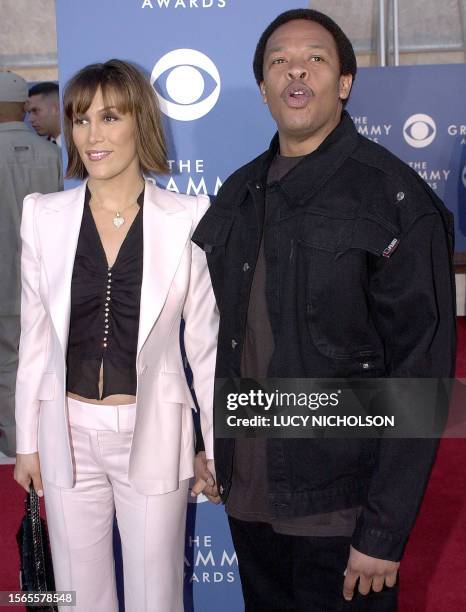 Singer-producer Dr Dre arrives at the 43rd Annual Grammy Awards with his wife Nicole in Los Angeles 21 February 2001. AFP PHOTO/ Lucy NICHOLSON