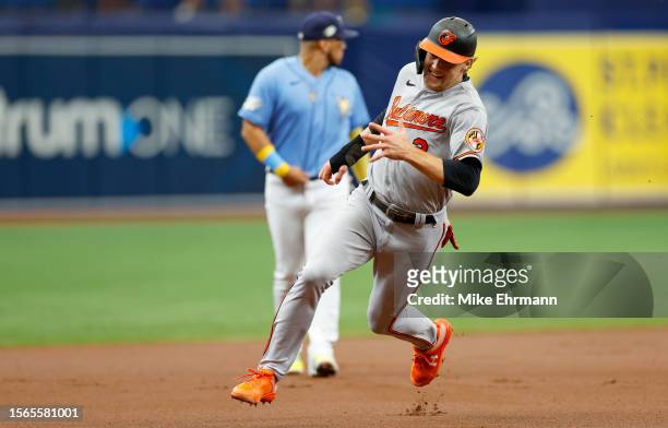 Gunnar Henderson of the Baltimore Orioles scores a run in the first inning during a game against the Tampa Bay Rays at Tropicana Field on July 23,...