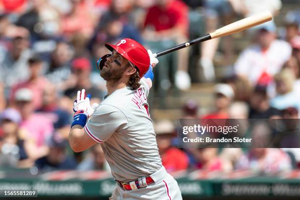 Bryce Harper of the Philadelphia Phillies flies out during the seventh inning against the Cleveland Guardians at Progressive Field on July 23, 2023...