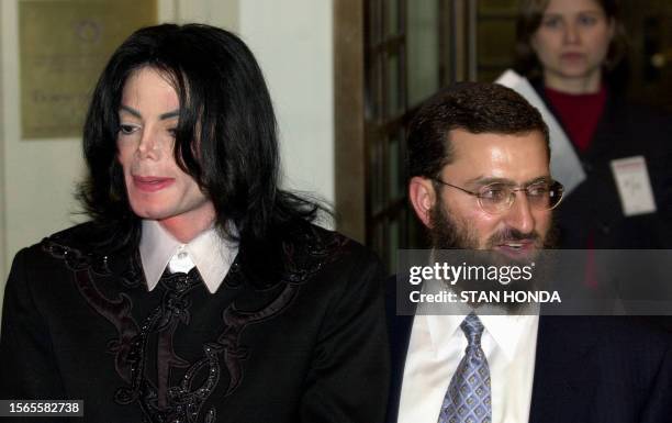 Pop icon Michael Jackson poses with Rabbi Shmuley Boteach 14 February at the Carnegie Hall in New York. Jackson hosted a panel discussion for his...