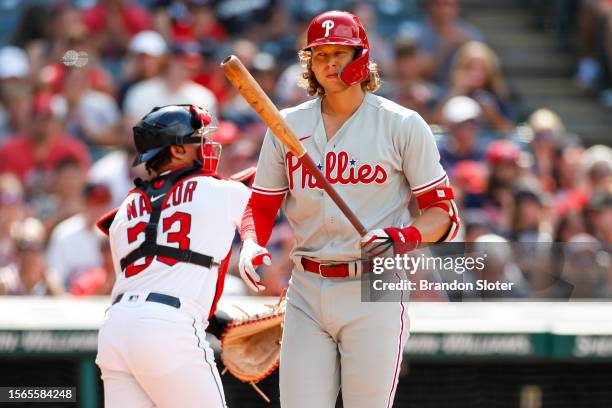 Alec Bohm of the Philadelphia Phillies strikes out during the eighth inning against the Cleveland Guardians at Progressive Field on July 23, 2023 in...