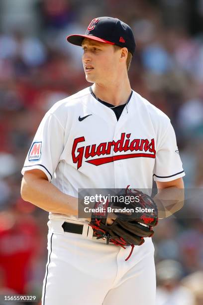 Tim Herrin of the Cleveland Guardians prepares to throw a pitch during the ninth inning against the Philadelphia Phillies at Progressive Field on...