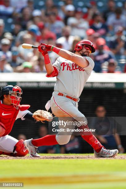 Kyle Schwarber of the Philadelphia Phillies swings the bat during the ninth inning against the Cleveland Guardians at Progressive Field on July 23,...