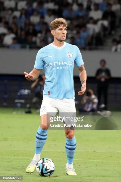 John Stones of Manchester City in action during the preseason friendly match between Manchester City and Yokohama F.Marinos at National Stadium on...