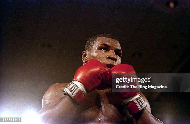 Mike Tyson looks to take a punch to Jose Ribalta during a bout at Trump Plaza Hotel on August 17, 1986 in Atlantic City, New Jersey.Mike Tyson...