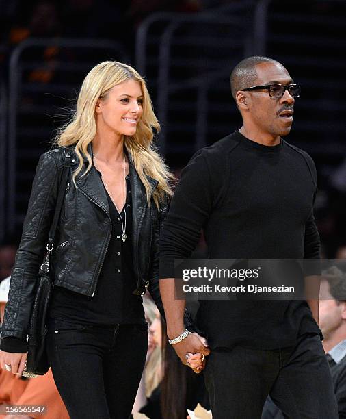 Actor Eddie Murphy and his girlfriend 33-year old Australian model Paige Butcher attend the NBA basketball game between the Los Angeles Lakers and...