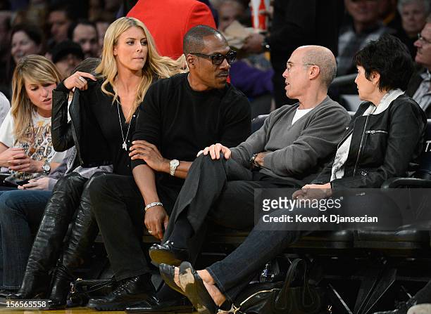 Actor Eddie Murphy and his girlfriend 33-year old Australian model Paige Butcher attend the NBA basketball game between the Los Angeles Lakers and...