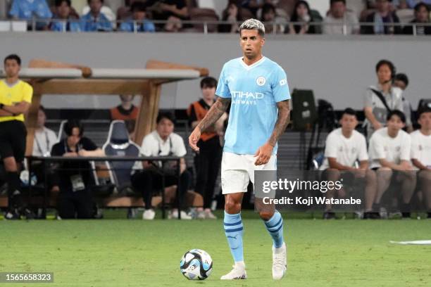 Joao Cancelo of Manchester City in action during the preseason friendly match between Manchester City and Yokohama F.Marinos at National Stadium on...