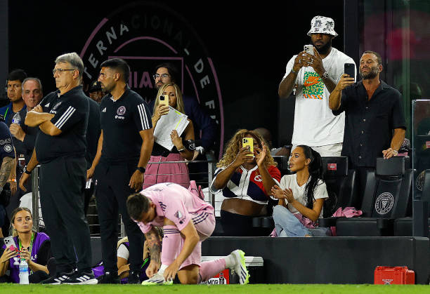 Lionel Messi of Inter Miami CF prepares to enter as WTA player Serena Williams and NBA player LeBron James of the Los Angeles Lakers take photos as...